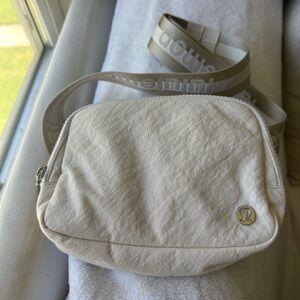 Lululemon Athletica Cream Crossbody Bag with Minimalist Design